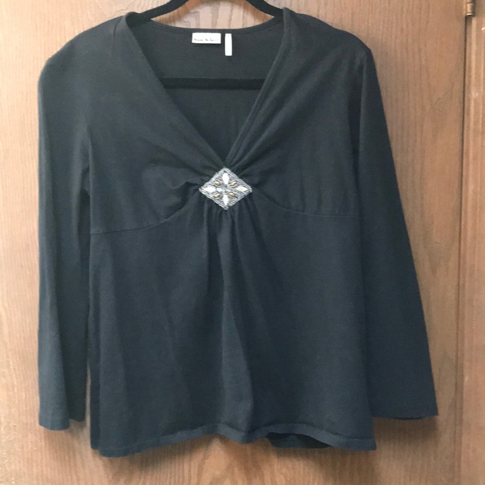 Nicole Miller black top with medallion
